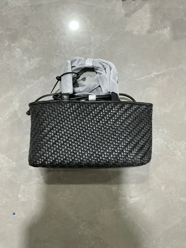 An image of a Black-Leather TF2530 Weaved Leather Handbag by Mirra Masa