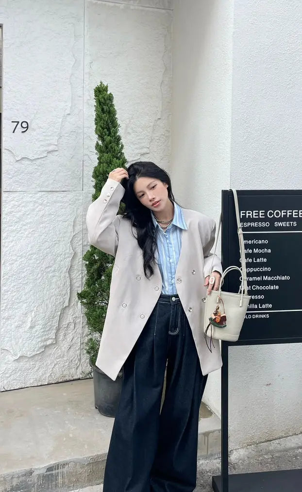 An image of a Pebble-grey-Leather TF9699 Leather Bucket Handbag by Mirra Masa
