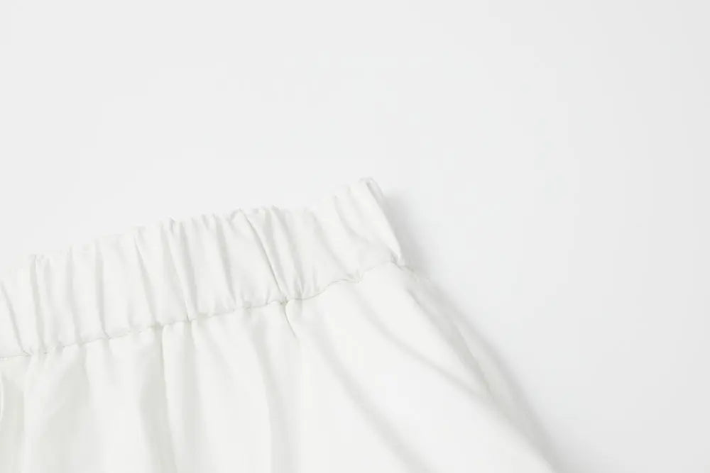 An image of a   10015 Everyday Breezy Midi Skirt by  Mirra Masa