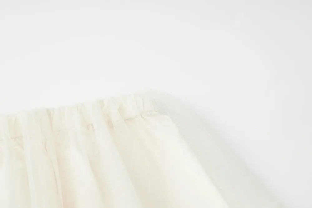 An image of a   10206 Layered Tulle Ruffle Midi Skirt by  Mirra Masa