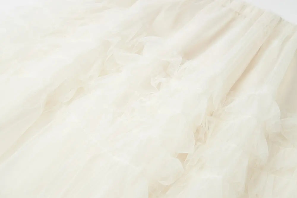 An image of a   10206 Layered Tulle Ruffle Midi Skirt by  Mirra Masa