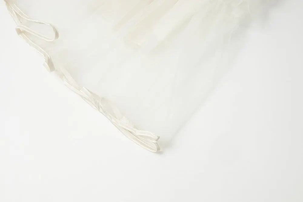 An image of a   10206 Layered Tulle Ruffle Midi Skirt by  Mirra Masa
