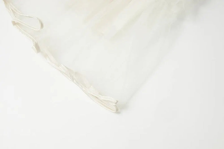 An image of a   10206 Layered Tulle Ruffle Midi Skirt by  Mirra Masa