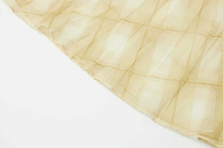 An image of a   10276 Checkered Pleated Skirt by  Mirra Masa