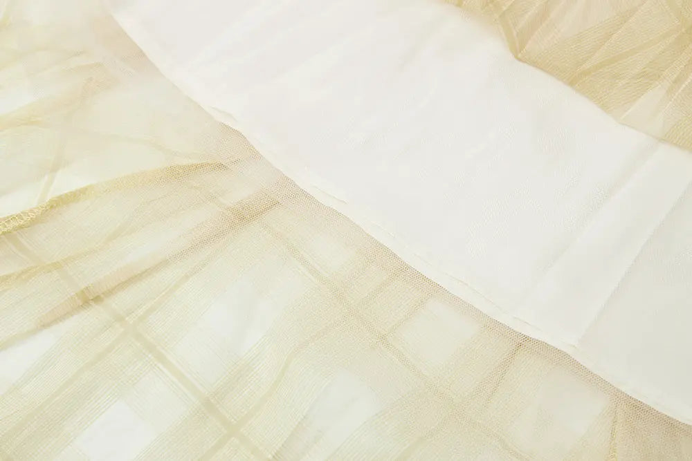 An image of a   10276 Checkered Pleated Skirt by  Mirra Masa