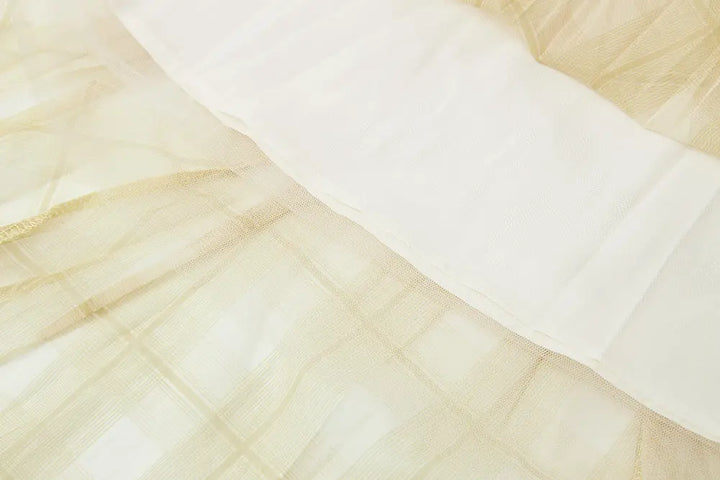 An image of a   10276 Checkered Pleated Skirt by  Mirra Masa