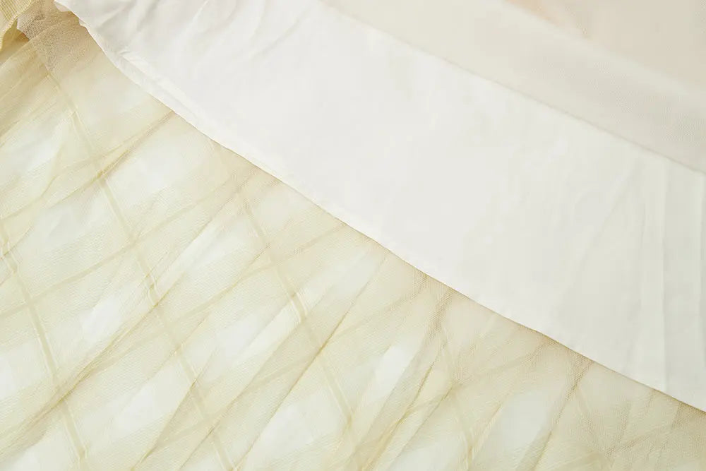 An image of a   10276 Checkered Pleated Skirt by  Mirra Masa