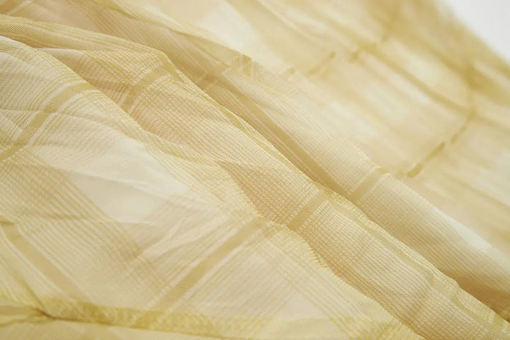 An image of a   10276 Checkered Pleated Skirt by  Mirra Masa