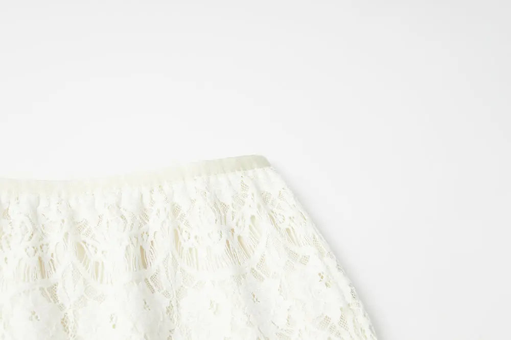 An image of a   10516 Scalloped Lace Midi Skirt by  Mirra Masa