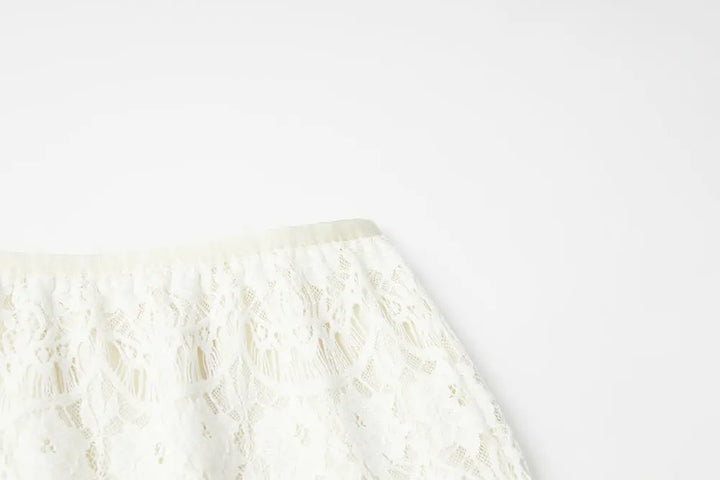 An image of a   10516 Scalloped Lace Midi Skirt by  Mirra Masa