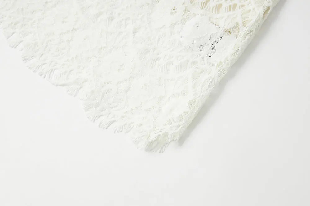 An image of a   10516 Scalloped Lace Midi Skirt by  Mirra Masa