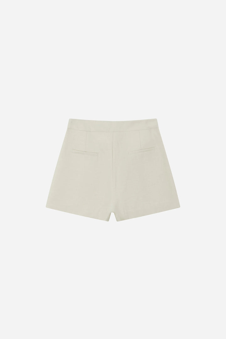 An image of a   10996 Asymmetric Button-Wrap Skirt by  Mirra Masa