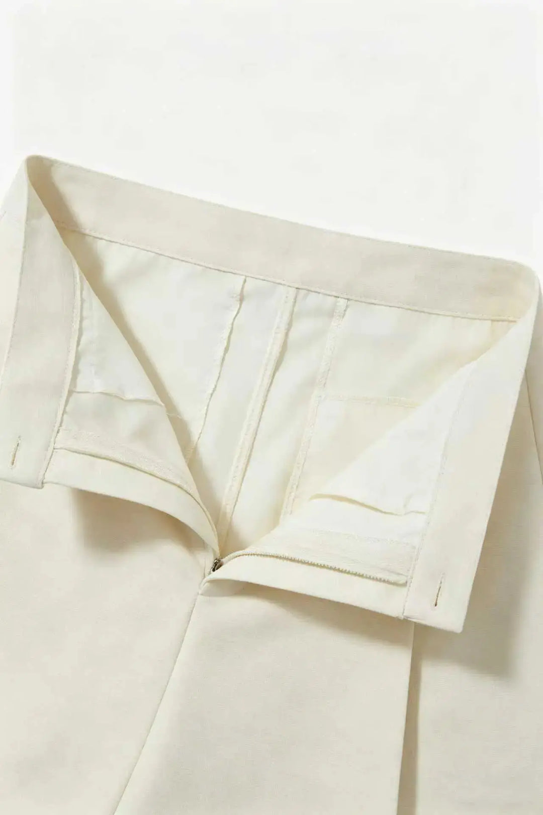 An image of a   10996 Asymmetric Button-Wrap Skirt by  Mirra Masa