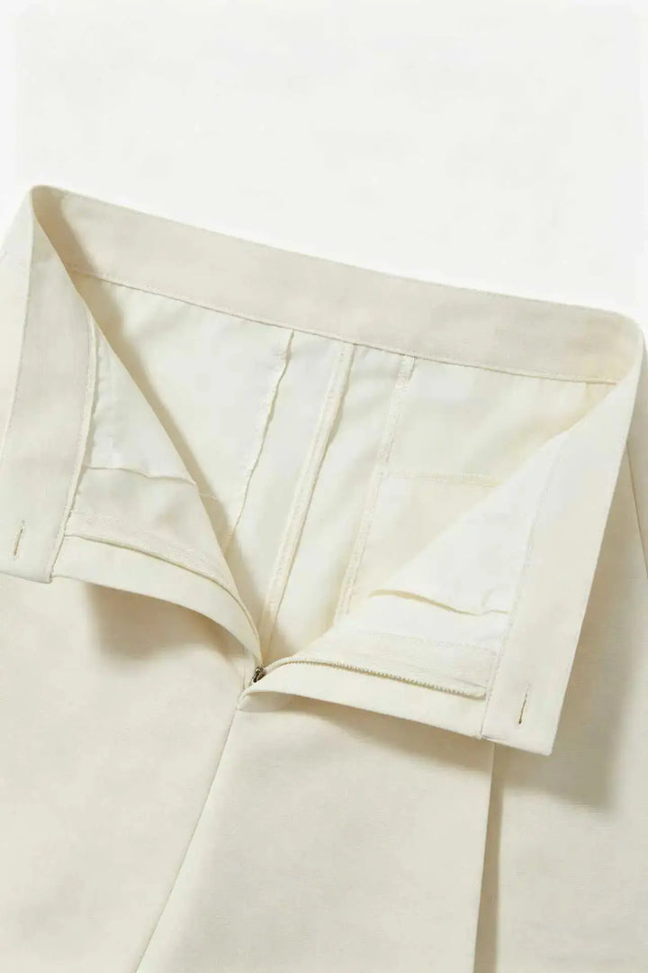 An image of a   10996 Asymmetric Button-Wrap Skirt by  Mirra Masa