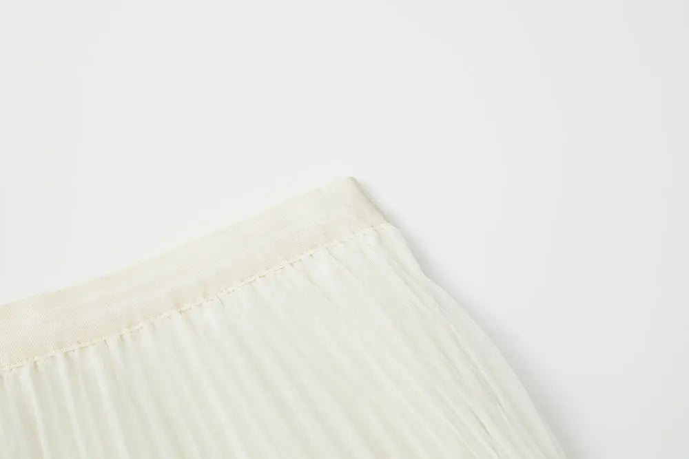 An image of a   10997 Layered Pleated Skirt by  Mirra Masa