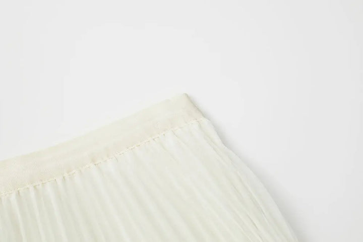 An image of a   10997 Layered Pleated Skirt by  Mirra Masa