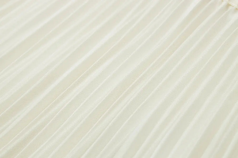 An image of a   10997 Layered Pleated Skirt by  Mirra Masa