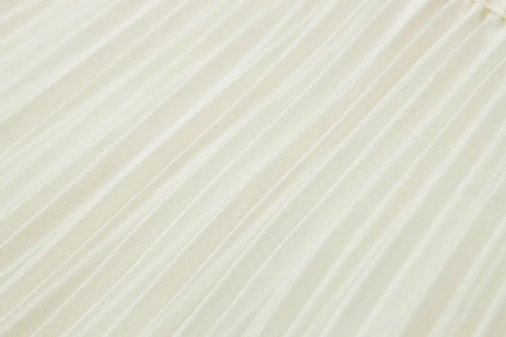 An image of a   10997 Layered Pleated Skirt by  Mirra Masa