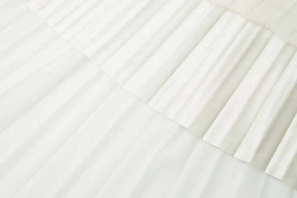 An image of a   10997 Layered Pleated Skirt by  Mirra Masa