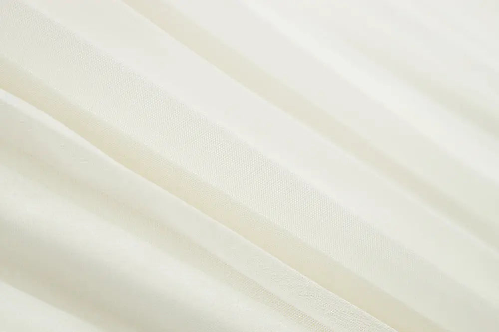 An image of a   10997 Layered Pleated Skirt by  Mirra Masa