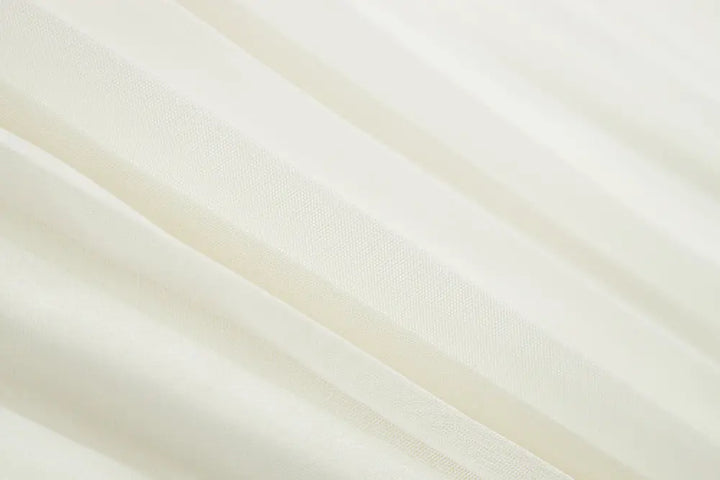 An image of a   10997 Layered Pleated Skirt by  Mirra Masa