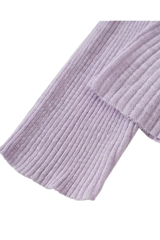 An image of a   11030 Ribbed V-Neck Cardigan by  Mirra Masa