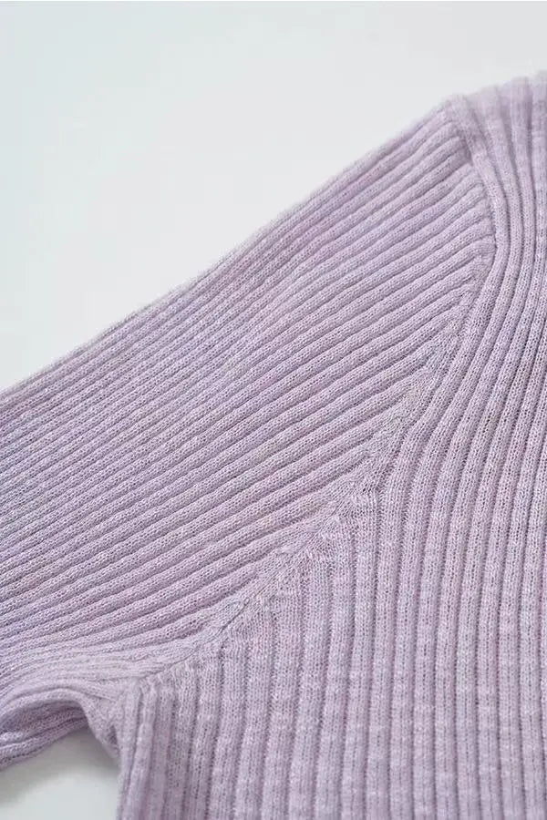 An image of a   11030 Ribbed V-Neck Cardigan by  Mirra Masa