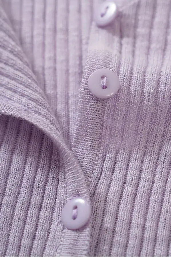 An image of a   11030 Ribbed V-Neck Cardigan by  Mirra Masa