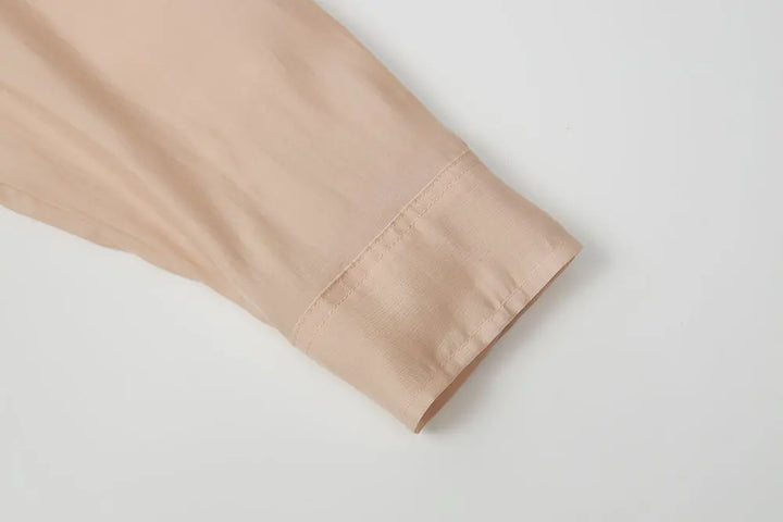 An image of a   11044 Side-Tie Button-Down Shirt by  Mirra Masa