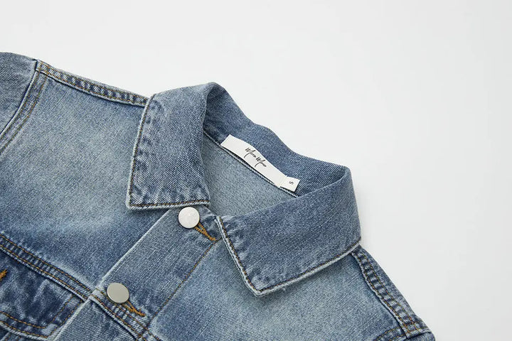 An image of a   11102 Cropped Vintage Wash Denim Jacket by  Mirra Masa
