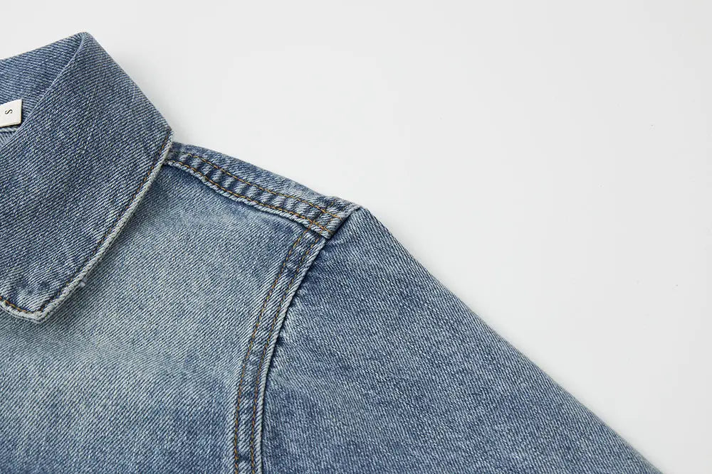 An image of a   11102 Cropped Vintage Wash Denim Jacket by  Mirra Masa