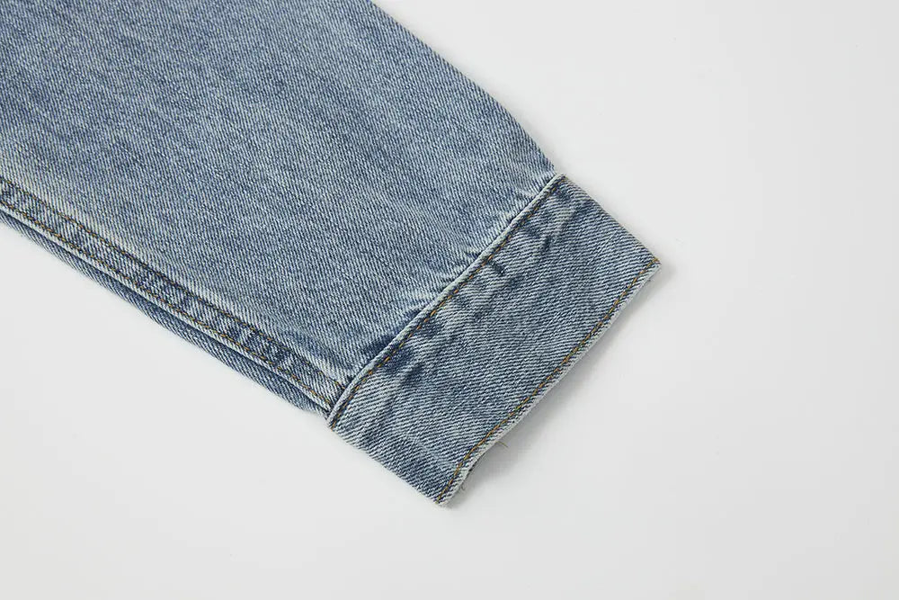 An image of a   11102 Cropped Vintage Wash Denim Jacket by  Mirra Masa