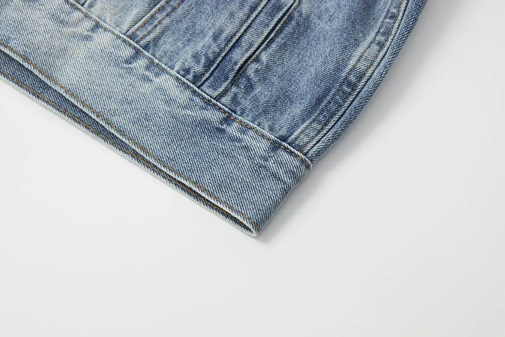 An image of a   11102 Cropped Vintage Wash Denim Jacket by  Mirra Masa