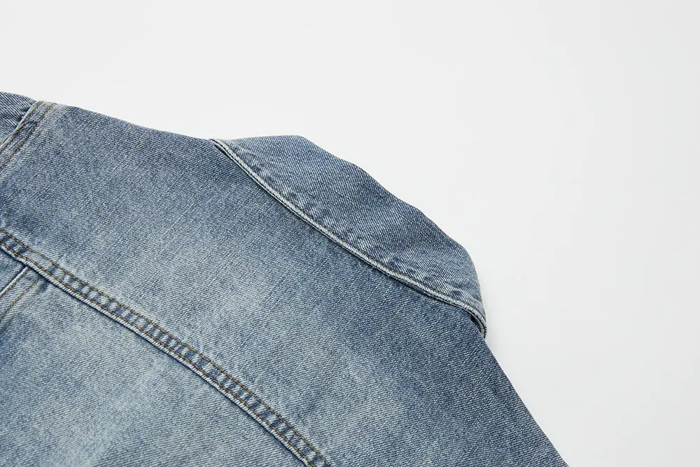 An image of a   11102 Cropped Vintage Wash Denim Jacket by  Mirra Masa
