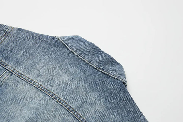 An image of a   11102 Cropped Vintage Wash Denim Jacket by  Mirra Masa