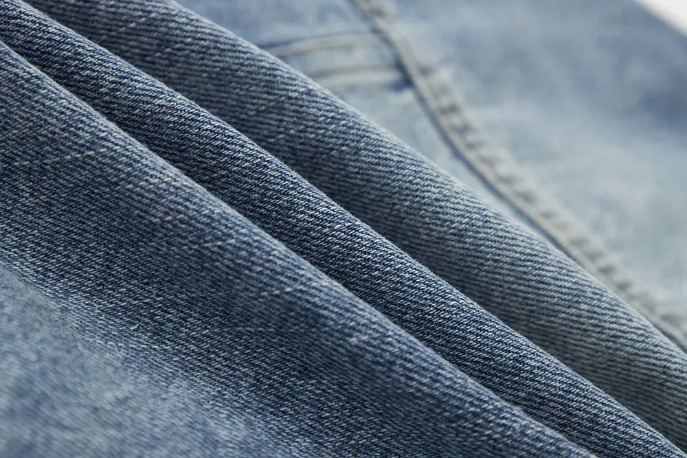 An image of a   11102 Cropped Vintage Wash Denim Jacket by  Mirra Masa