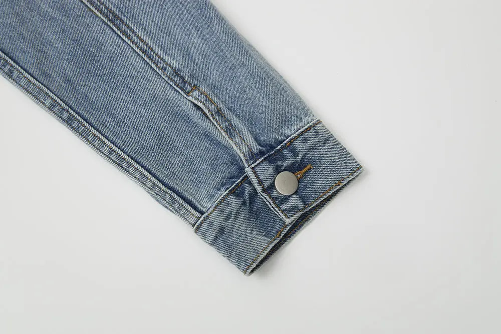 An image of a   11102 Cropped Vintage Wash Denim Jacket by  Mirra Masa