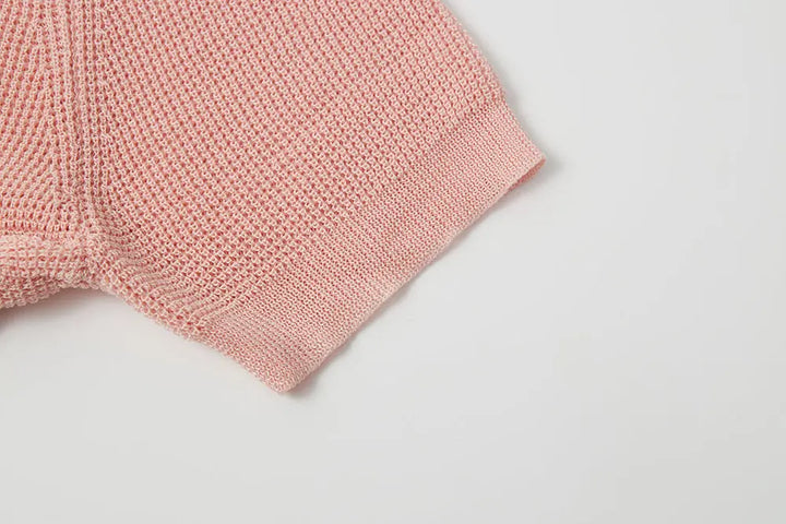 An image of a   11113 Short Sleeve Knit Polo by  Mirra Masa