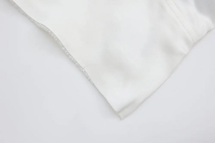 An image of a   11152 Structured Satin Camisole by  Mirra Masa