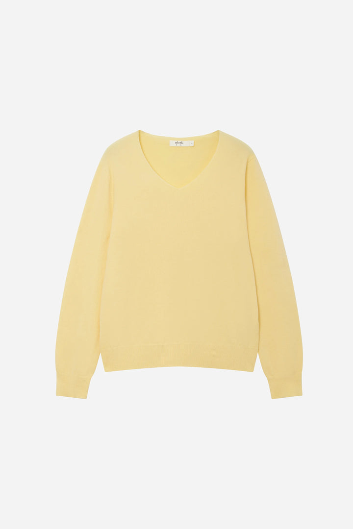 An image of a   11175 Essential Long Sleeve V-Neck Knit Top by  Mirra Masa