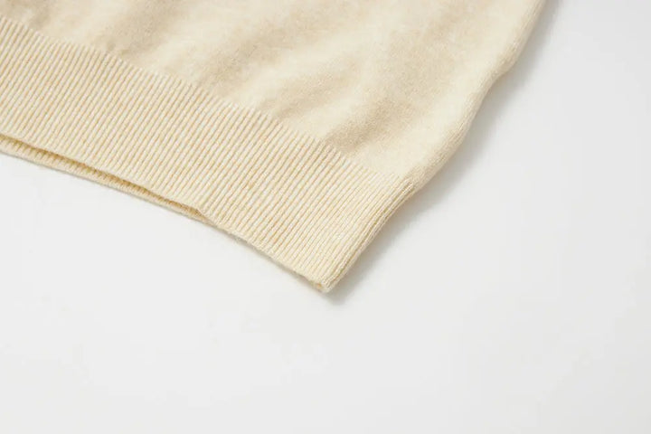 An image of a   11175 Essential Long Sleeve V-Neck Knit Top by  Mirra Masa