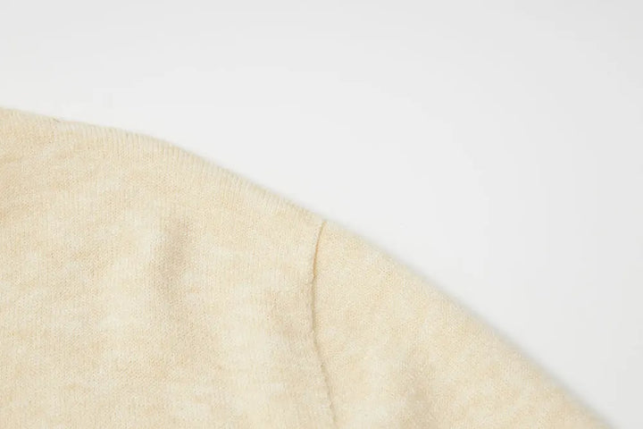 An image of a   11175 Essential Long Sleeve V-Neck Knit Top by  Mirra Masa