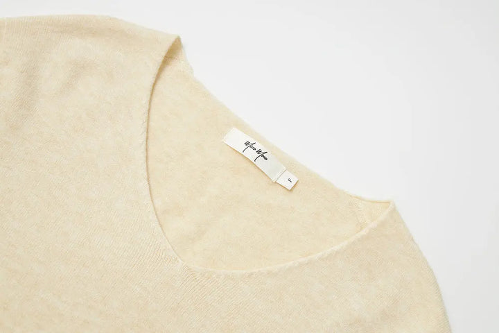 An image of a   11175 Essential Long Sleeve V-Neck Knit Top by  Mirra Masa