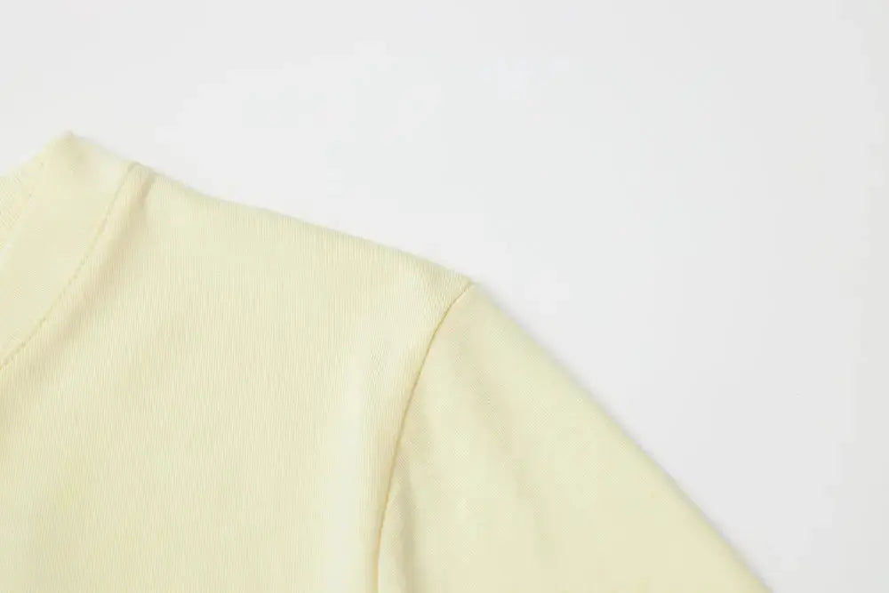 An image of a   11231 Floral Appliqué T-Shirt by  Mirra Masa