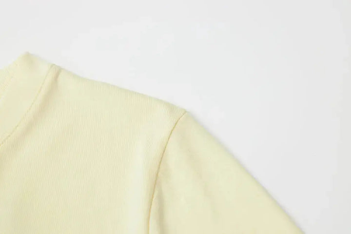 An image of a   11231 Floral Appliqué T-Shirt by  Mirra Masa