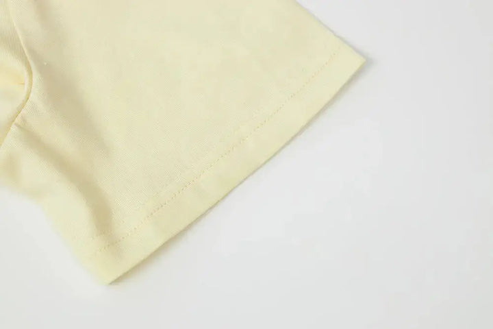 An image of a   11231 Floral Appliqué T-Shirt by  Mirra Masa
