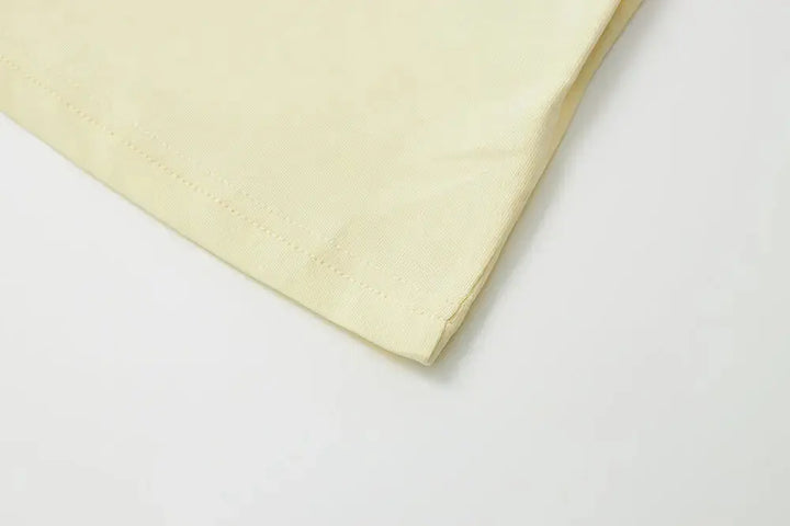 An image of a   11231 Floral Appliqué T-Shirt by  Mirra Masa