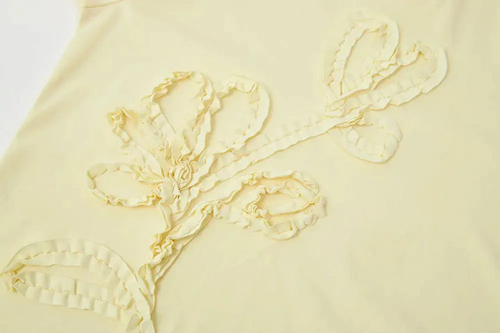 An image of a   11231 Floral Appliqué T-Shirt by  Mirra Masa