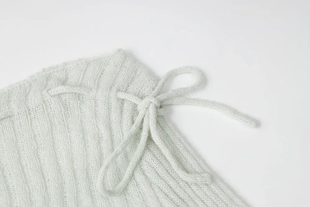 An image of a   11280 Ribbed Off-Shoulder Tie Knit by  Mirra Masa