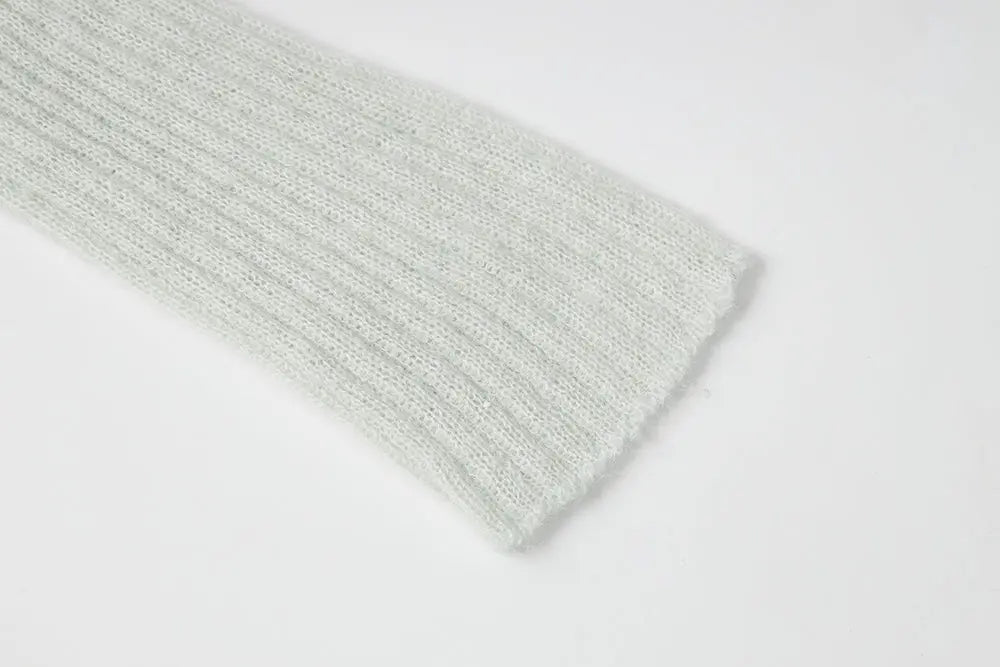 An image of a   11280 Ribbed Off-Shoulder Tie Knit by  Mirra Masa
